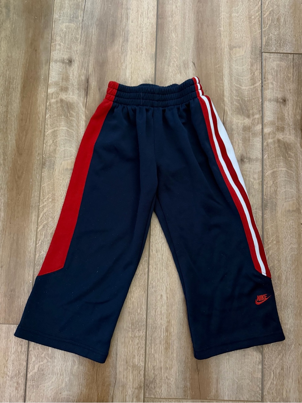 Nike Kids Navy Joggers with Red and White Stripes